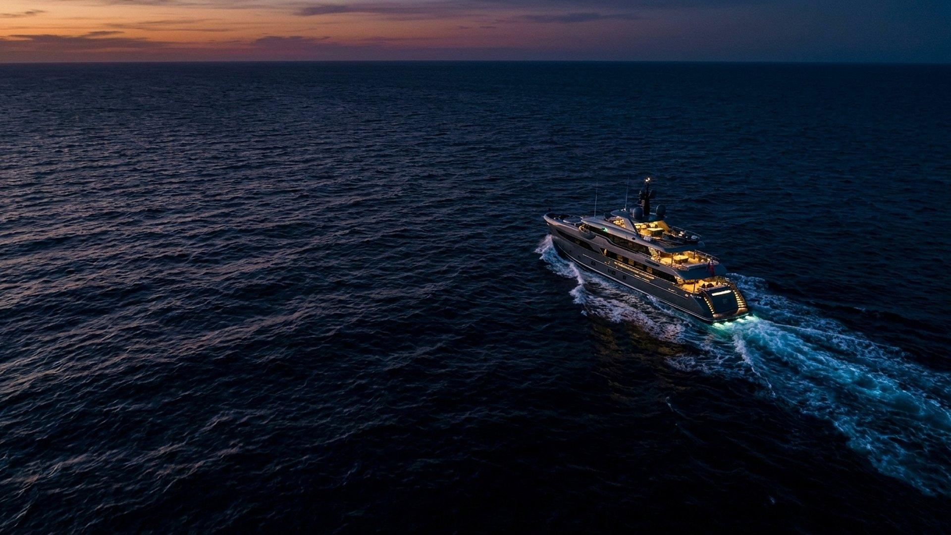 A modern expedition yacht cutting through dark open ocean at dusk, glowing wake trailing behind